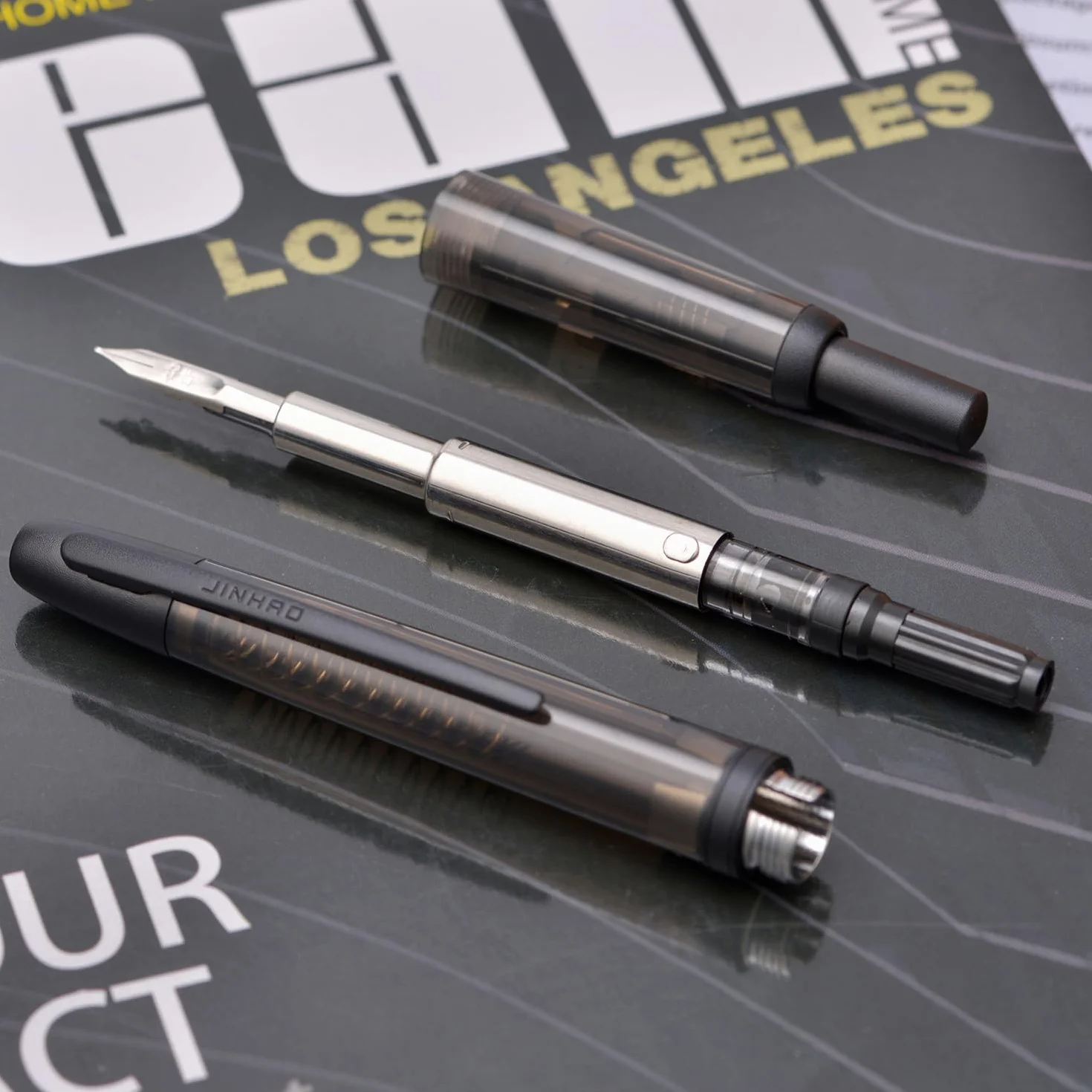 Jinhao Penna stilografica a pressione serie 20 pennino extra fine retrattile nero trasparente convertitore inchiostro